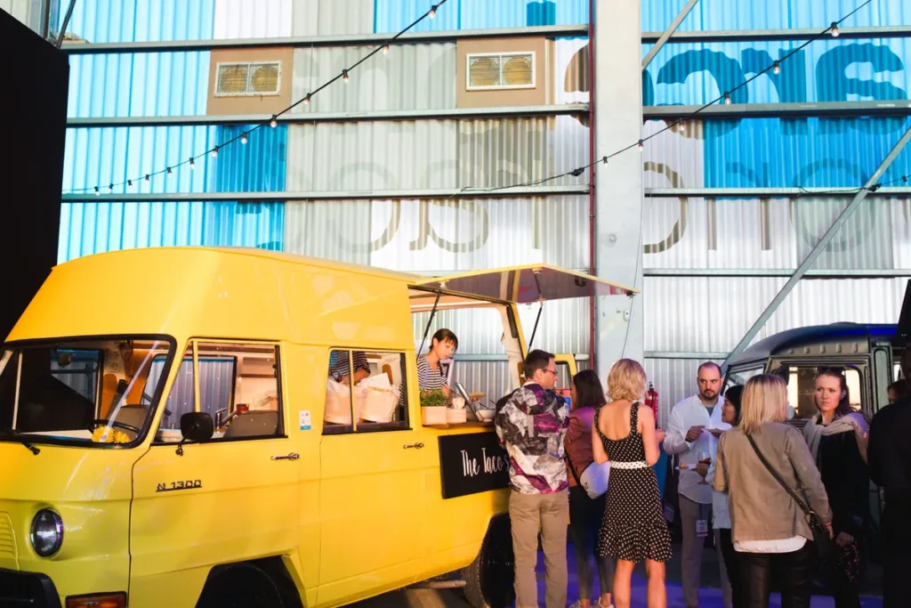 yellow-food-truck-corporate-catering-event svg+xml;charset=utf